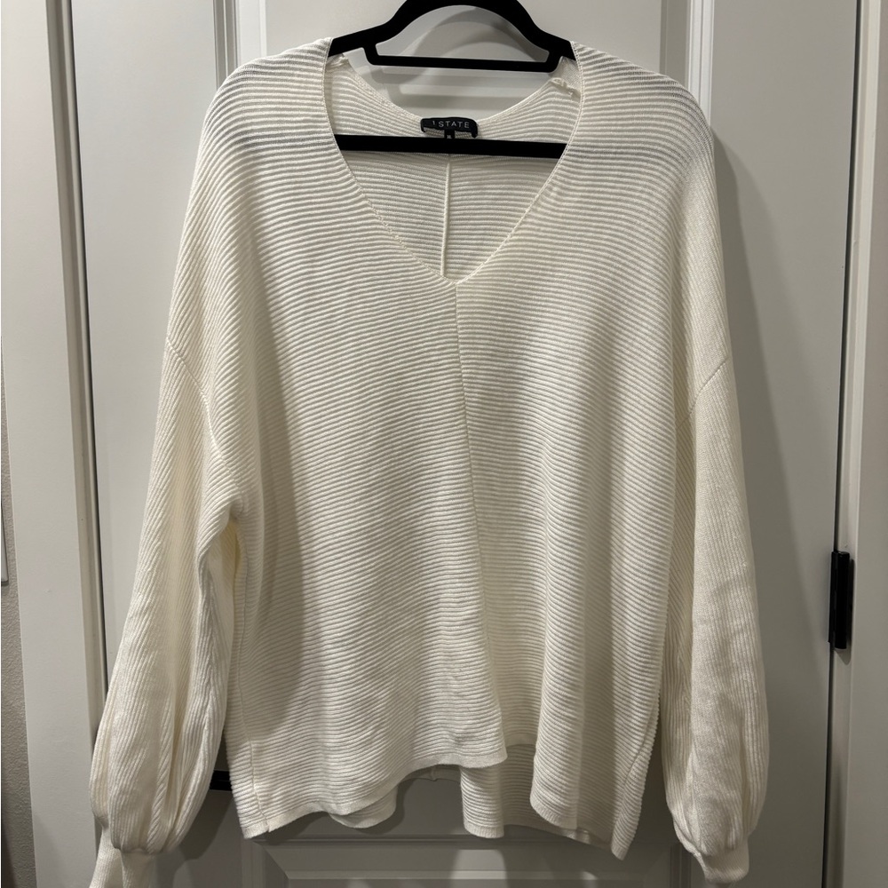 1. State Cream V-Neck Sweater